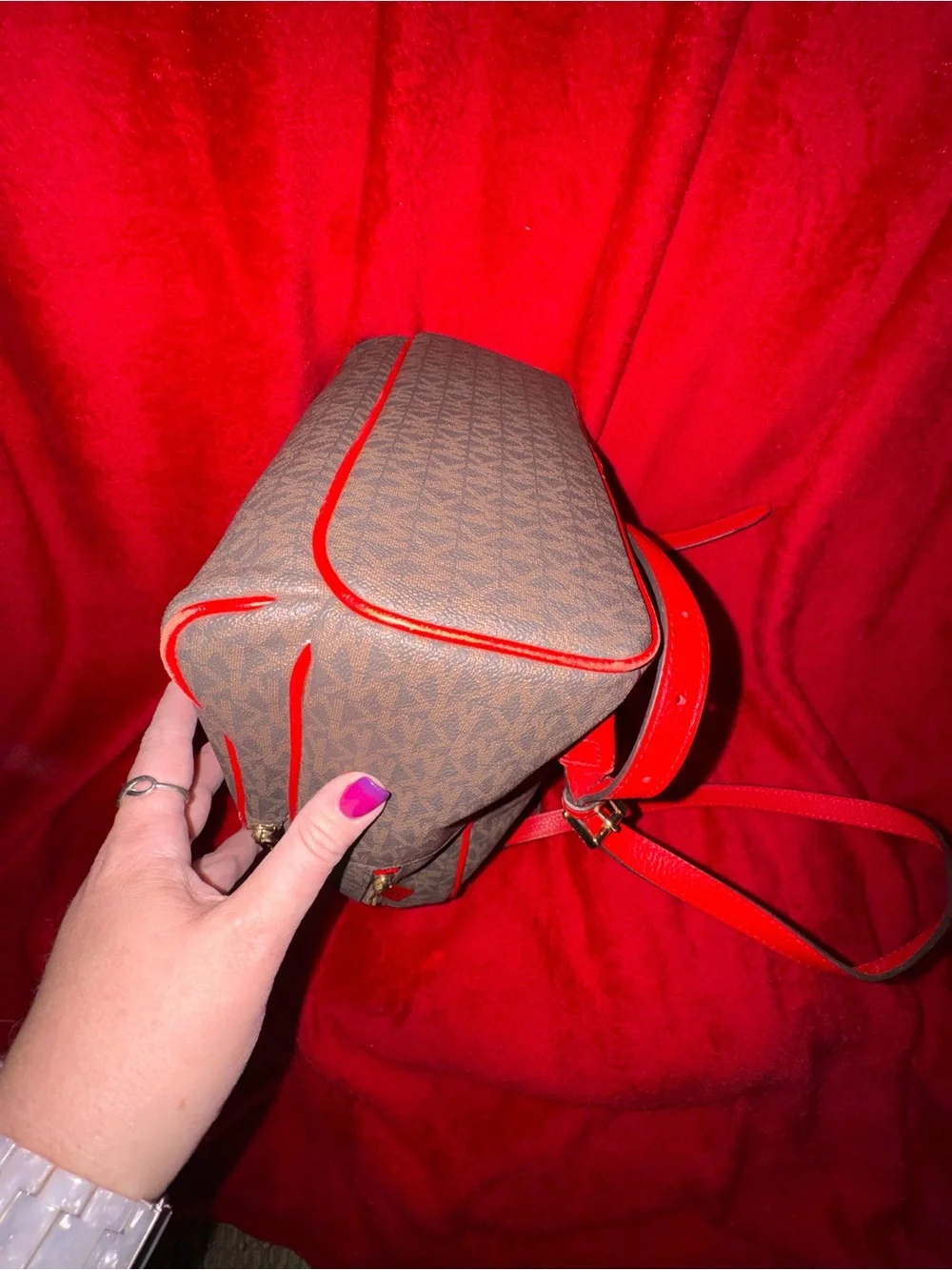Michael Kors Brown Monogram Backpack with Red Trim and Gold Logo